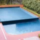 Picture of an automatic pool cover for the blog about types of pool covers.