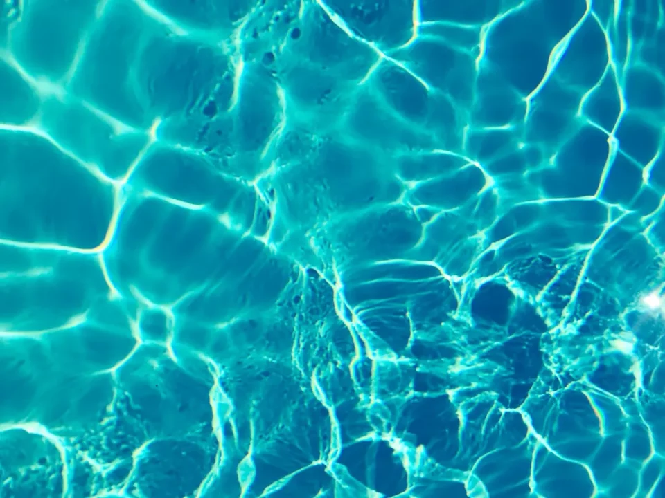 Picture of pool water for the article about saltwater pool FAQs.