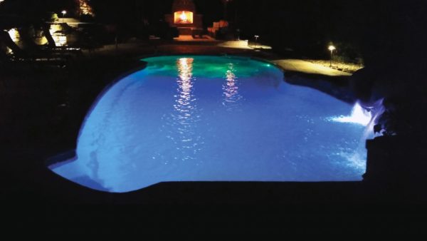 Swimming pool glowing in the dark.