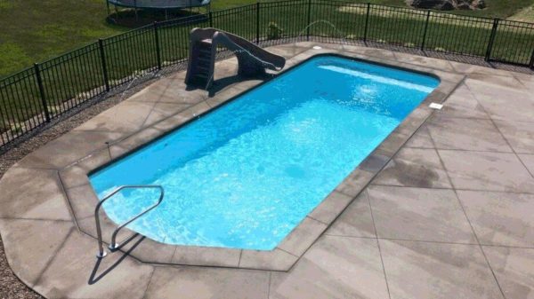 Swimming pool with pool slide.