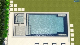 Swimming pool with green area surrounding pool.