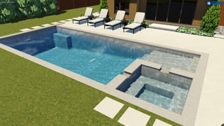 Swimming pool with integrated spa and pool lounge chairs.