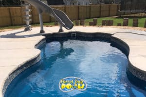inground fiberglass pool with twist slides