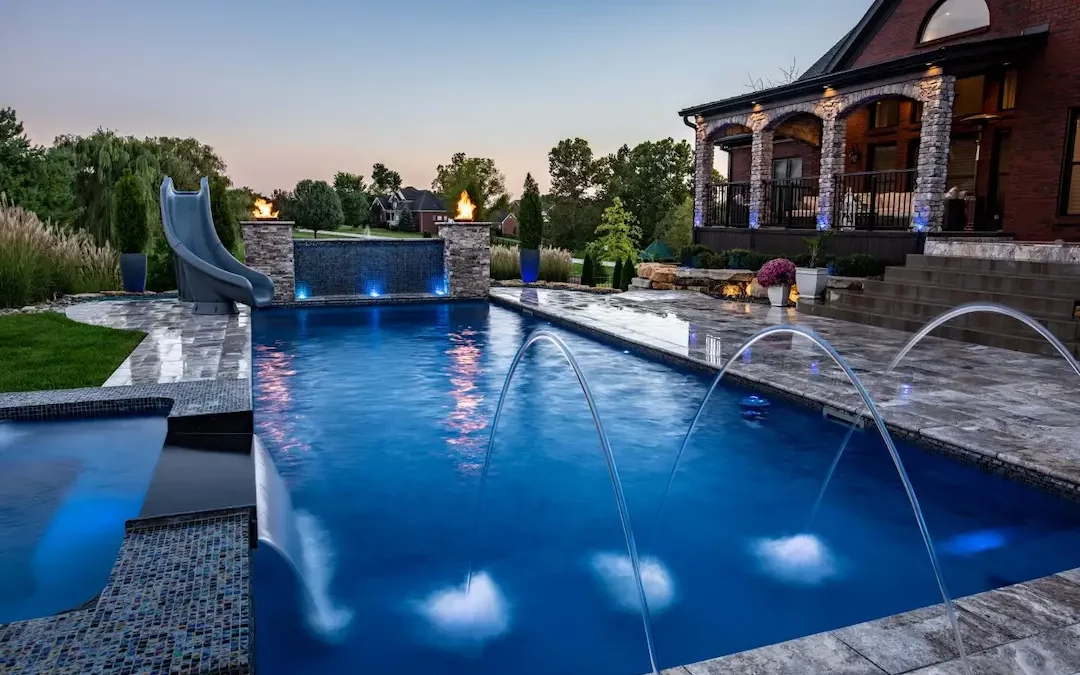 Photo of a gorgeous backyard, showing the best backyard pool ideas for inground pools in NC