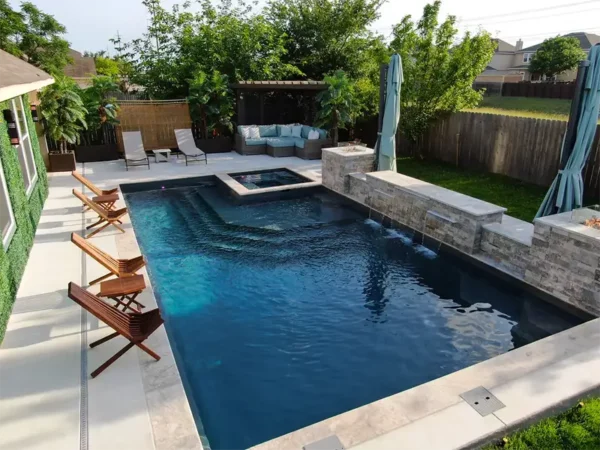Picture of the LUXE fiberglass pool model installed at a NC home.
