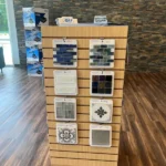 Pool tile choices on display at Parrot Bay Pools showroom in Benson, NC.